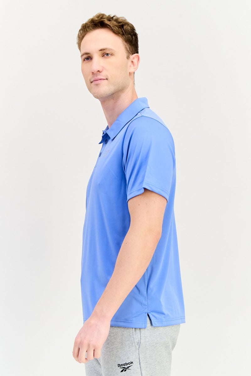 Reebok قميص بولو رياضي للرجال بأكمام قصيرة، خارجي، أزرق - Image 2