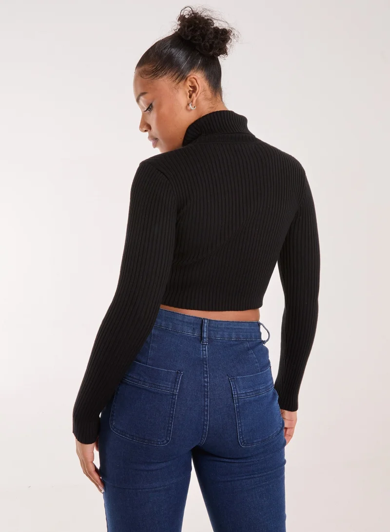 بينك فانيلا كنزة بياقة ملفوفة مضلعة بتفاصيل مقصوصة