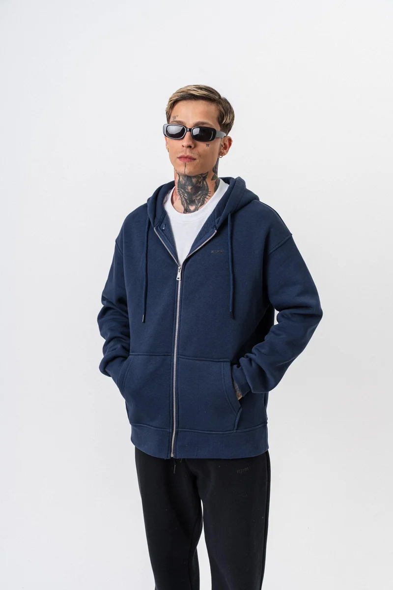 ريسباير هودي رجالي أساسي واسع (Oversize) بسحاب (Zip) بغطاء رأس بتفاصيل نص "Respire" لون كحلي