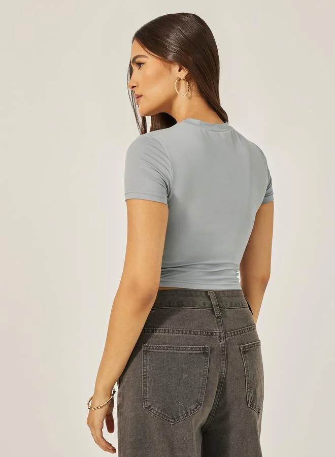 Styli Graphic Print Fitted Round Neck Crop T-Shirt