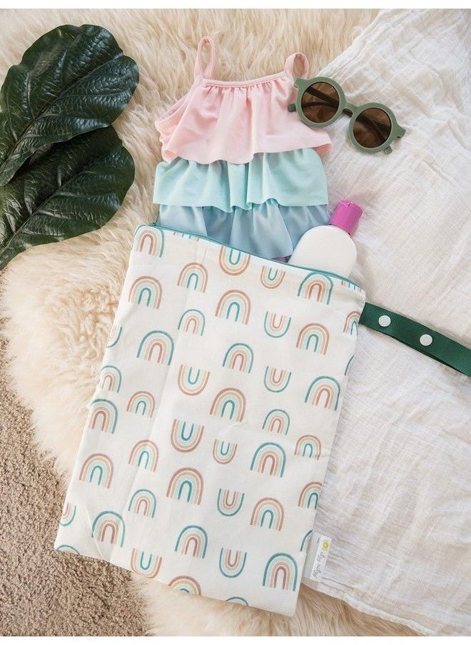 Itzy Ritzy - Sealed Wet Bag With Adjustable Handle Washable And Reusable Wet Bag With Water Resistant Lining Ideal For Swimwear Diapers Gym Clothes & Toiletries; Measures 11” X 14” Over The Rainbow - Image 1