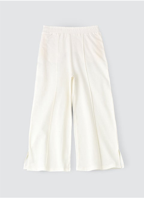 Solid knit pant with cut at bottom