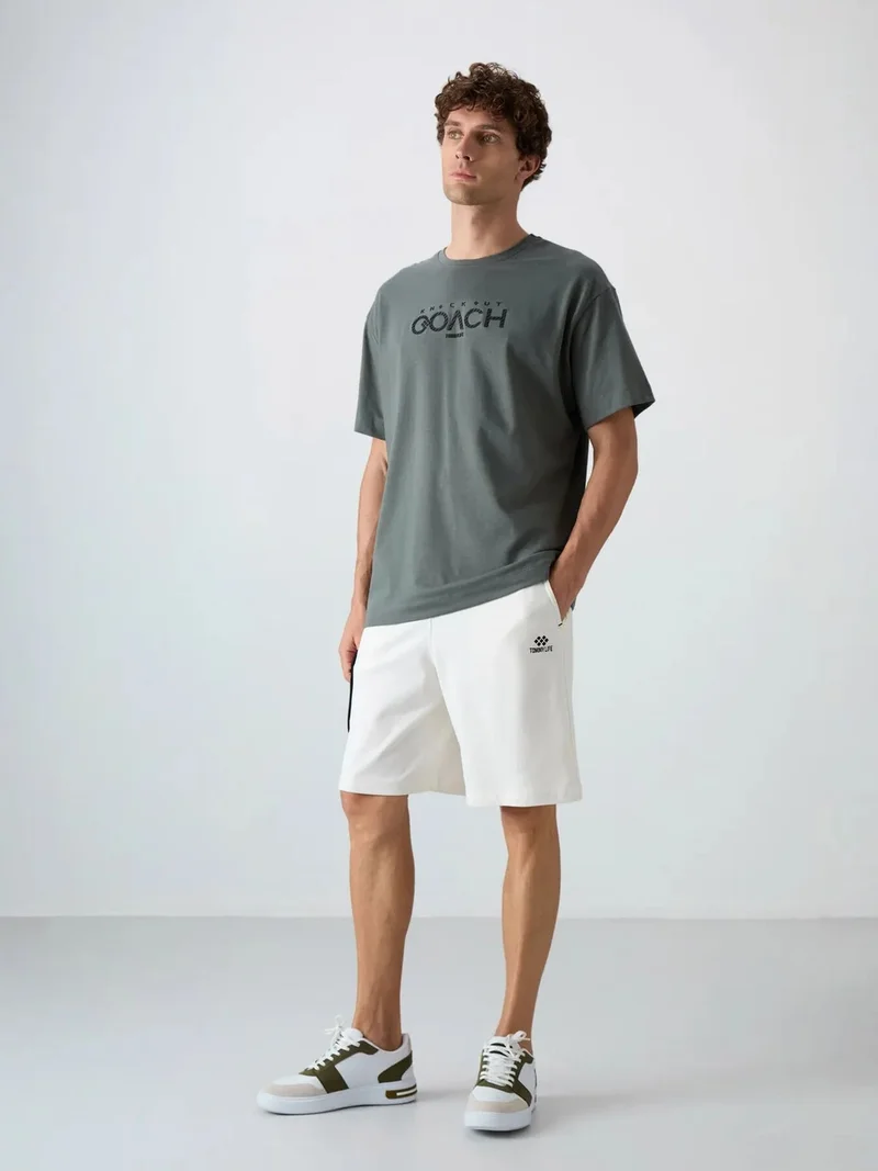 تومي لايف TOMMY Oversized Logo Patch Crew Neck T-Shirt