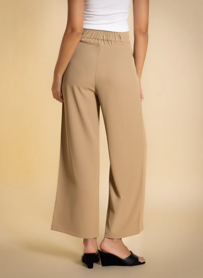 Shapes  HIGH-WAIST PLEATED TROUSERS for Women | Best Price UAE
