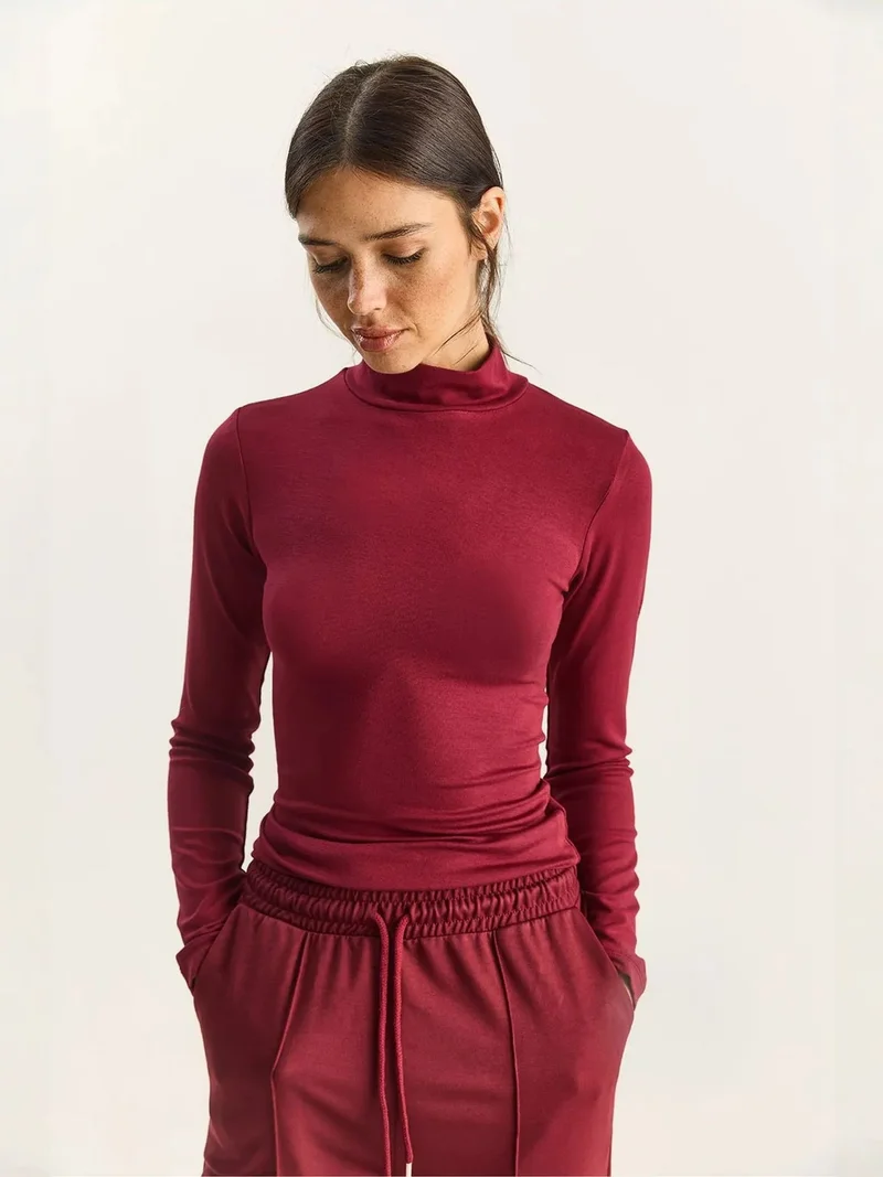 بيانكو لوتشي LUCCI Slim Fit Long Sleeve Half Turtleneck Top
