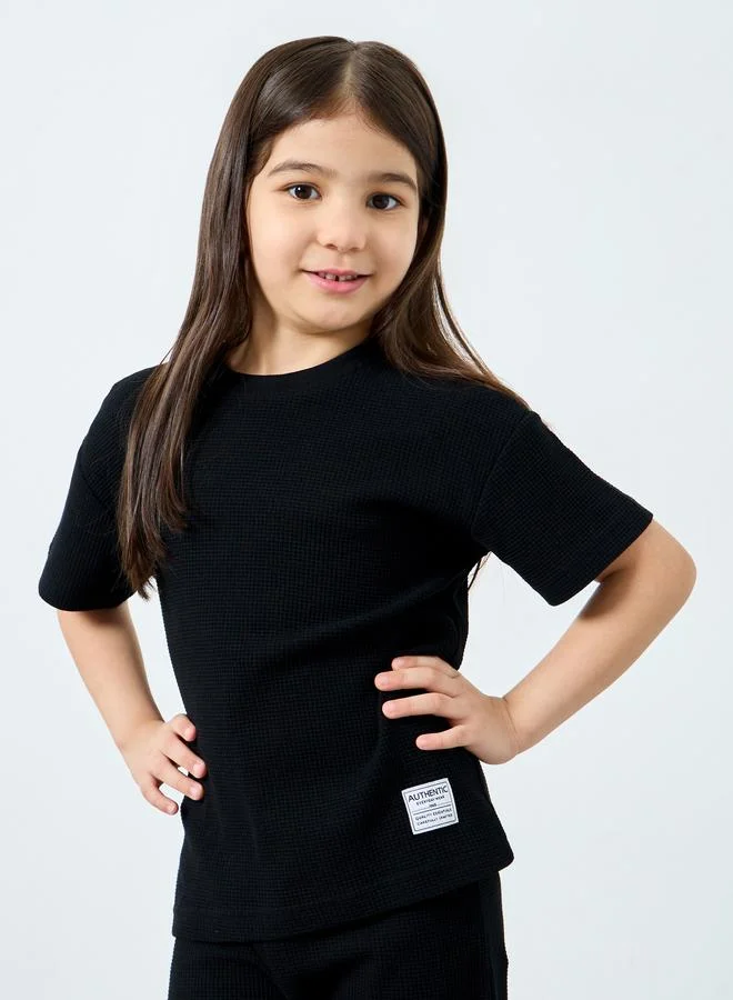 Styli Styli Girls Black Waffle Knit Top and Relaxed Joggers Set