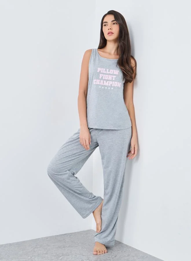 ستايلي Styli Pillow Fight Slogan Tank and Ruffle Waist Pyjama Set