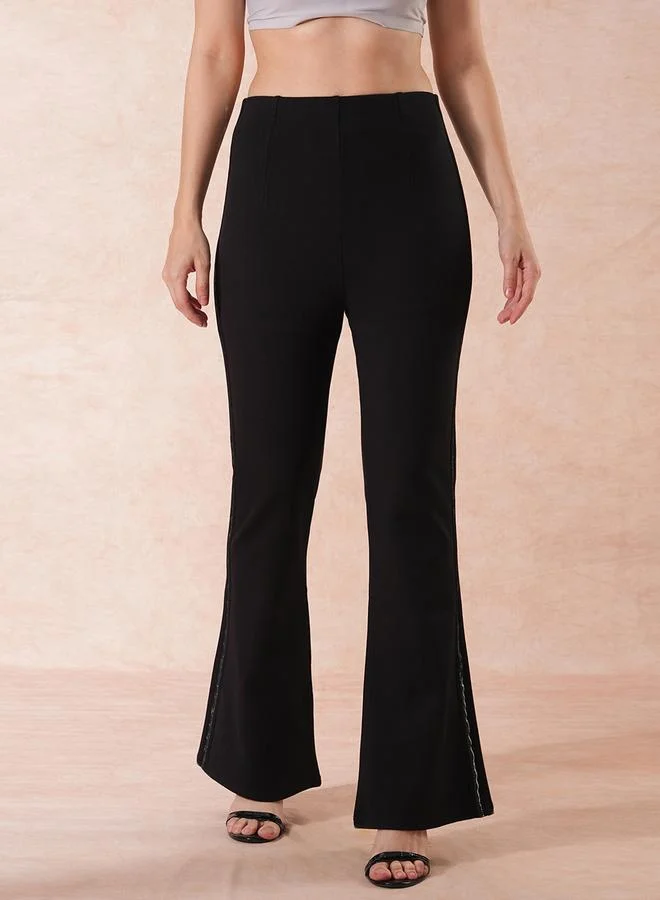 جلو باص بنطال تريقنز مزين من الجوانب بقصة واسعة