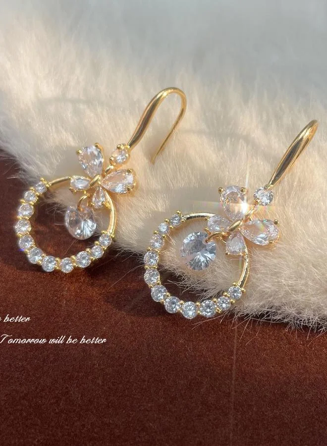 تايك تو أقراط دائرية مزينة بفراشة