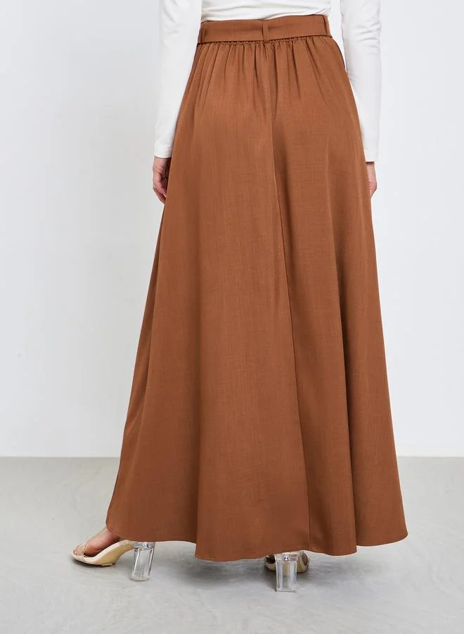 Styli Brown Brown Solid Belted A-Line Maxi Skirt for Women | Best Price UAE