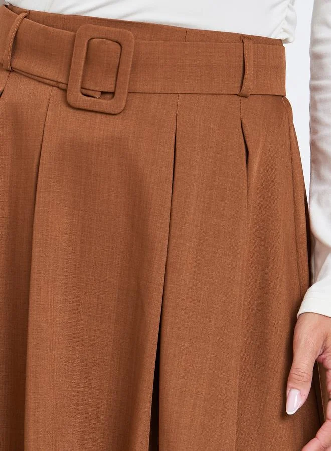 Styli Brown Brown Solid Belted A-Line Maxi Skirt for Women | Best Price UAE