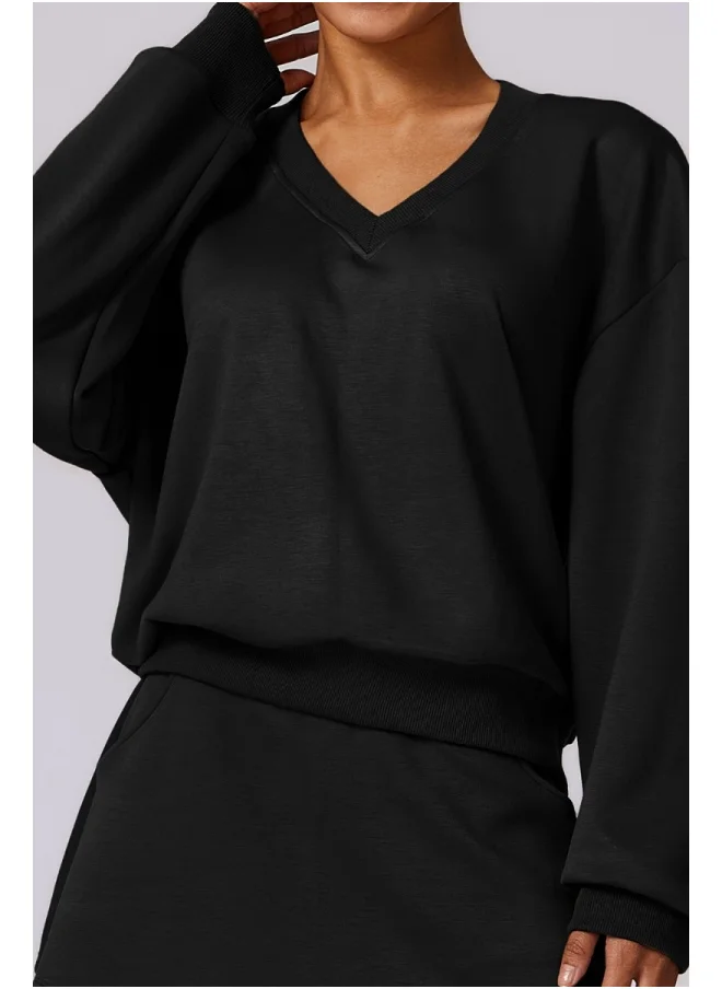 كون.يوغا KAWN YOGA Womens Loose Fit Light Sweatshirt