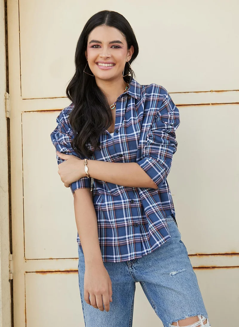 Campus Sutra Women's Navy Blue Tartan Plaid Oversized Shirt For Casual Wear | Spread Collar | Short Sleeve | Button Closure | Oversized Shirt Crafted With Comfort Fit For Everyday Wear