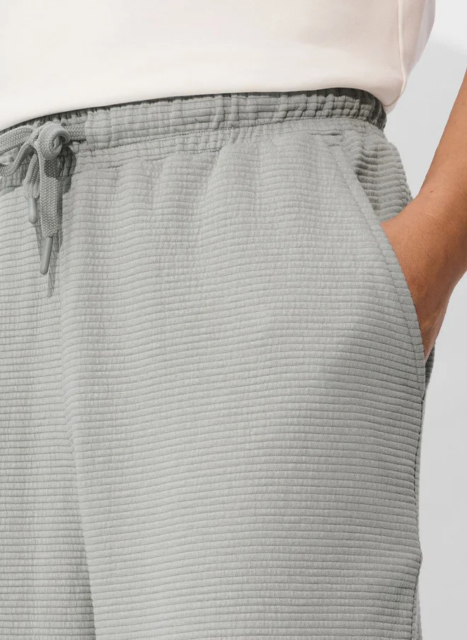 The Souled Store  The Souled Store Ash Grey Men Solid Tapered Fit Korean Joggers  | Best Price UAE