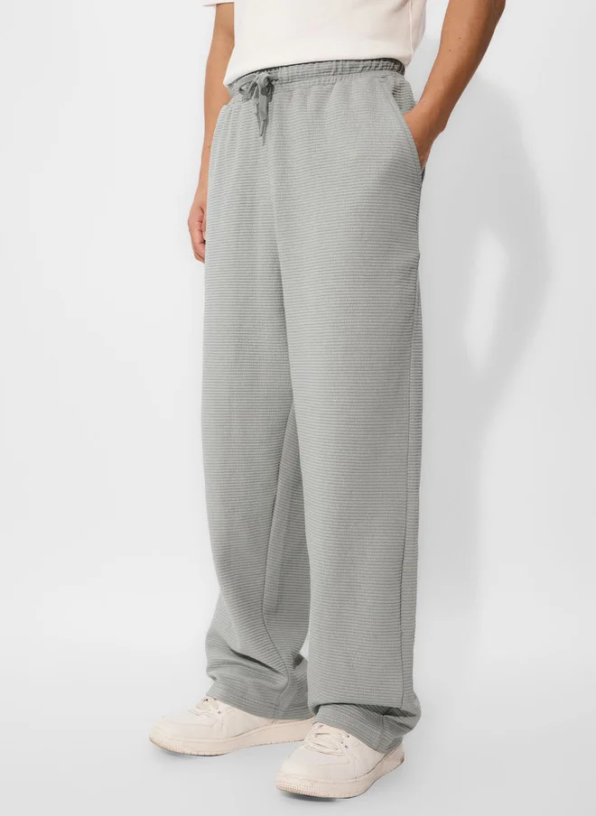The Souled Store  The Souled Store Ash Grey Men Solid Tapered Fit Korean Joggers  | Best Price UAE