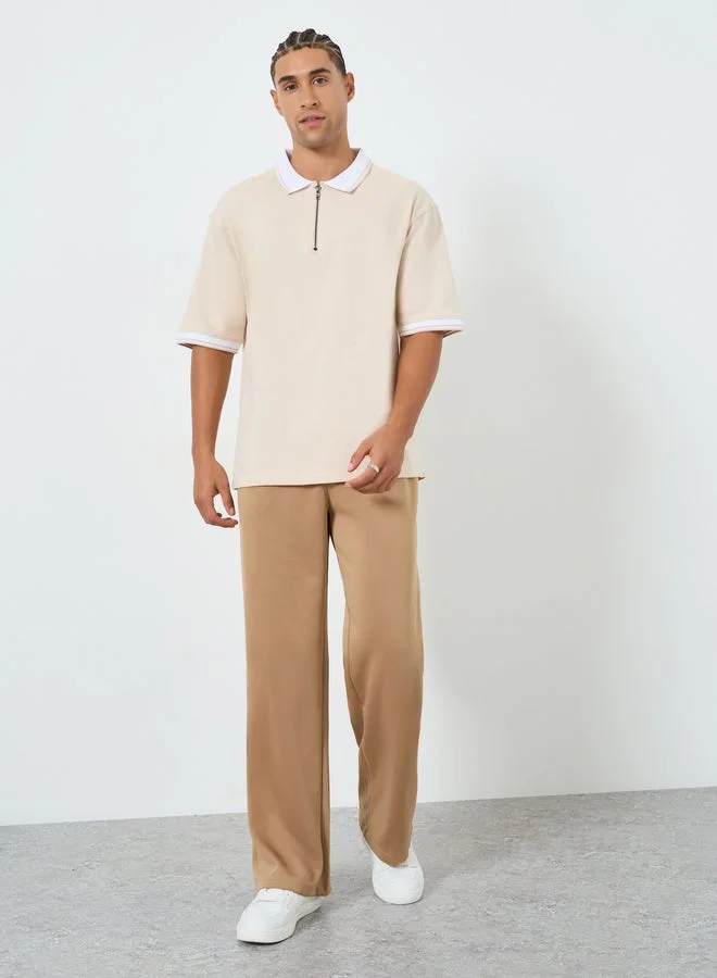 ستايلي تيشيرت بولو محبوك بقصة واسعة