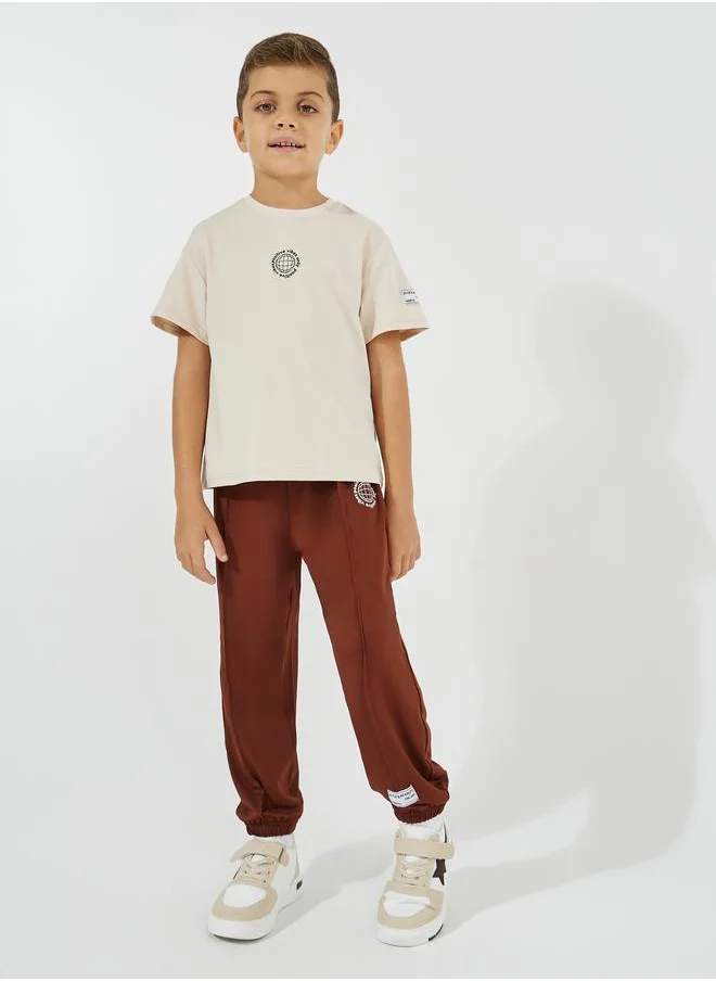 Styli Oversized Printed T-Shirt & Pintuck Detail Joggers Set