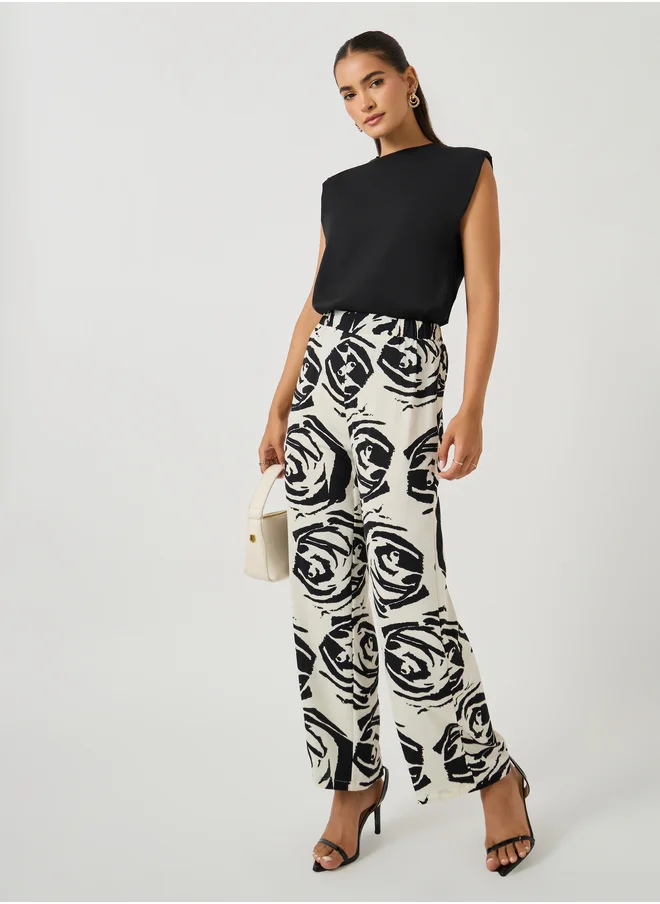 Take Two Solid Sleeveless Knit Top and Floral Print Wide Leg Pants Co-Ords