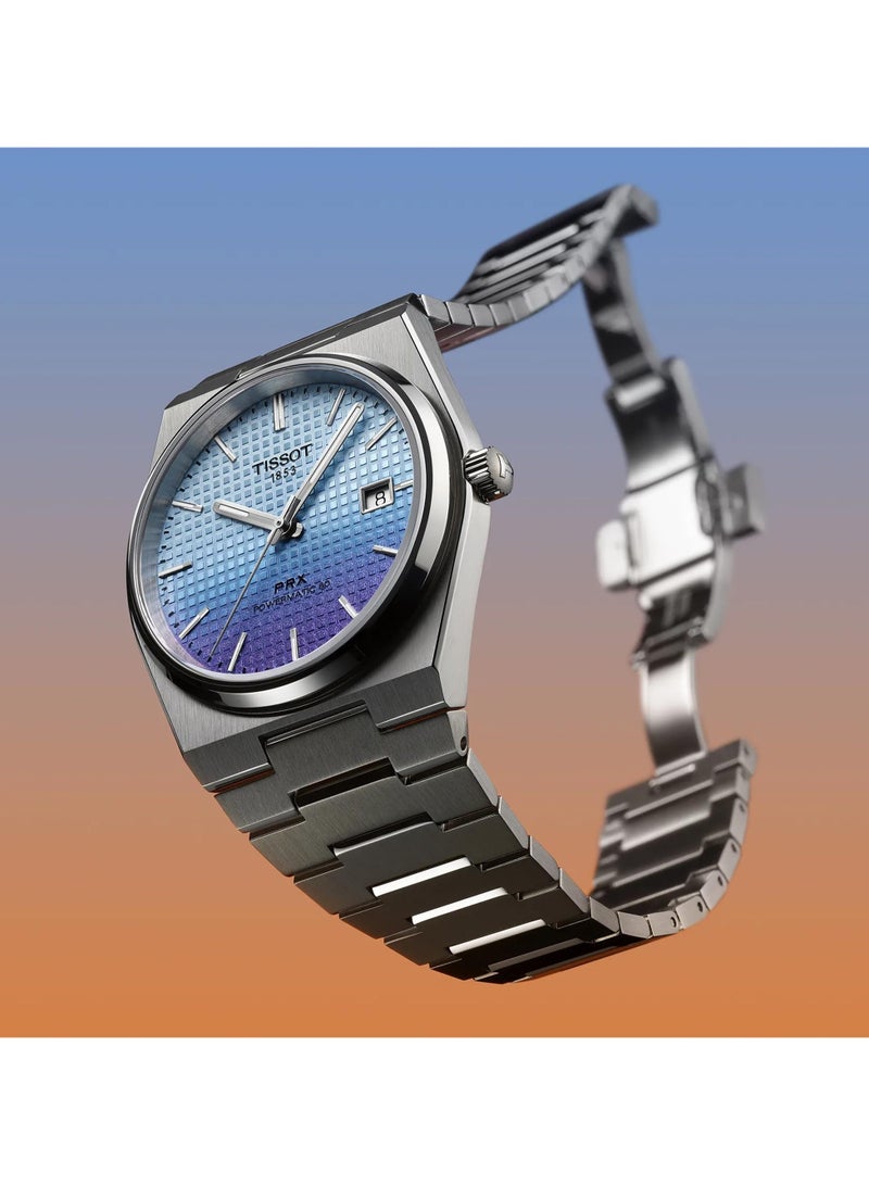 TISSOT ساعة PRX للرجال سويسرية الصنع بآلية باورماتيك بقرص فضي من الفولاذ المقاوم للصدأ بلون أزرق جليدي-كاميليون 40 مم T137.407.11.351.01 - Image 3