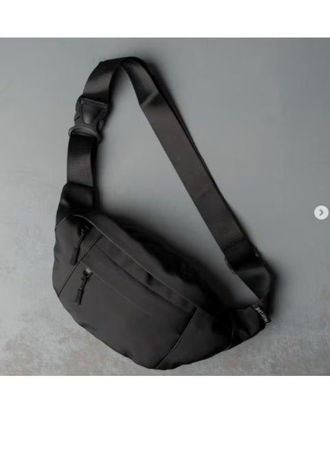 Crossbody and waist bag for women and men - practical, comfortable, and lightweight - gives you freedom of movement - protects all your belongings from the rain - black color, equipped with three zippers