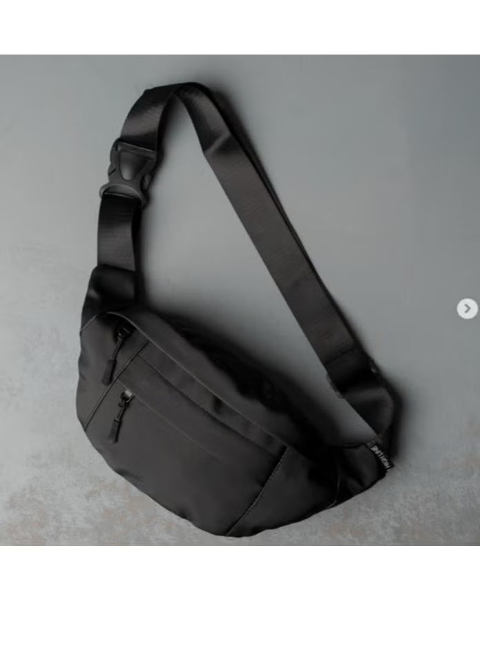 zoba Crossbody and waist bag for women and men - practical, comfortable, and lightweight - gives you freedom of movement - protects all your belongings from the rain - black color, equipped with three zippers - Image 1