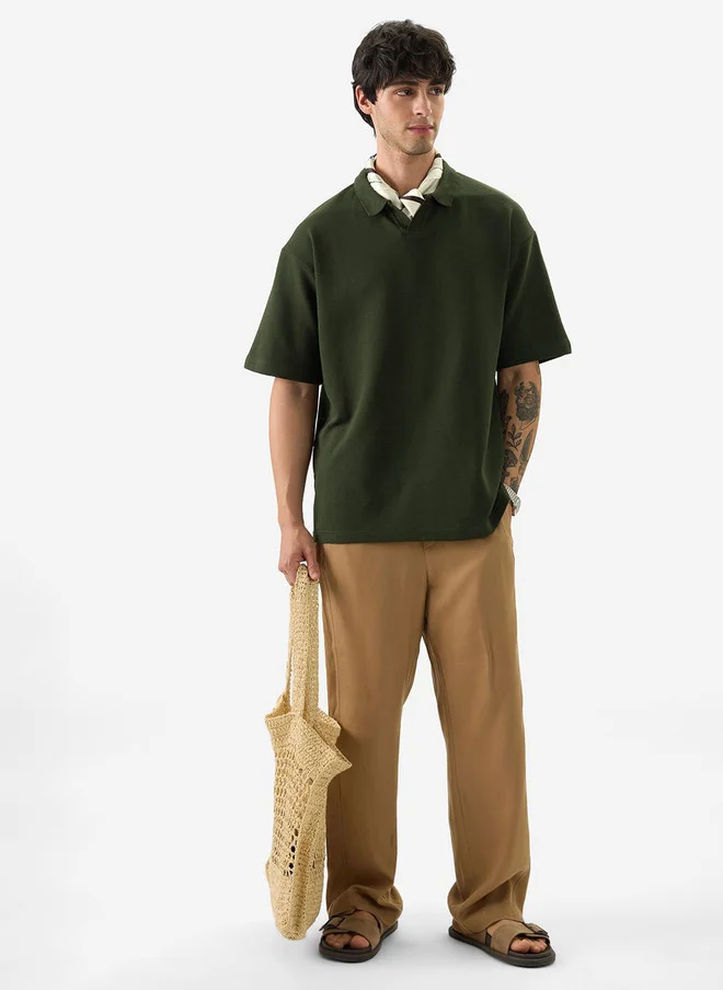 The Souled Store  The Souled Store Men Olive Green Solid Cottonblend Oversized Fit Polo  | Best Price UAE