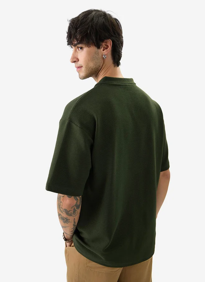 The Souled Store  The Souled Store Men Olive Green Solid Cottonblend Oversized Fit Polo  | Best Price UAE