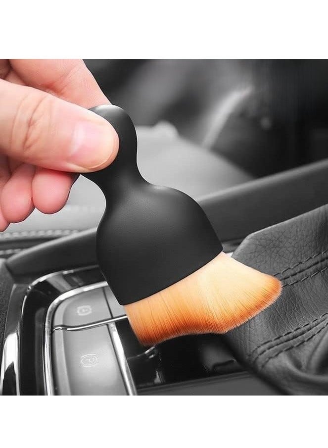 The cleaning brush's small, precise design helps you reach the smallest corners between buttons and remove dust easily. - Image 2