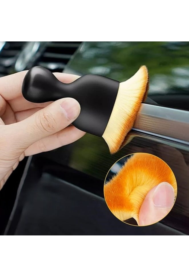 The cleaning brush's small, precise design helps you reach the smallest corners between buttons and remove dust easily. - Image 5