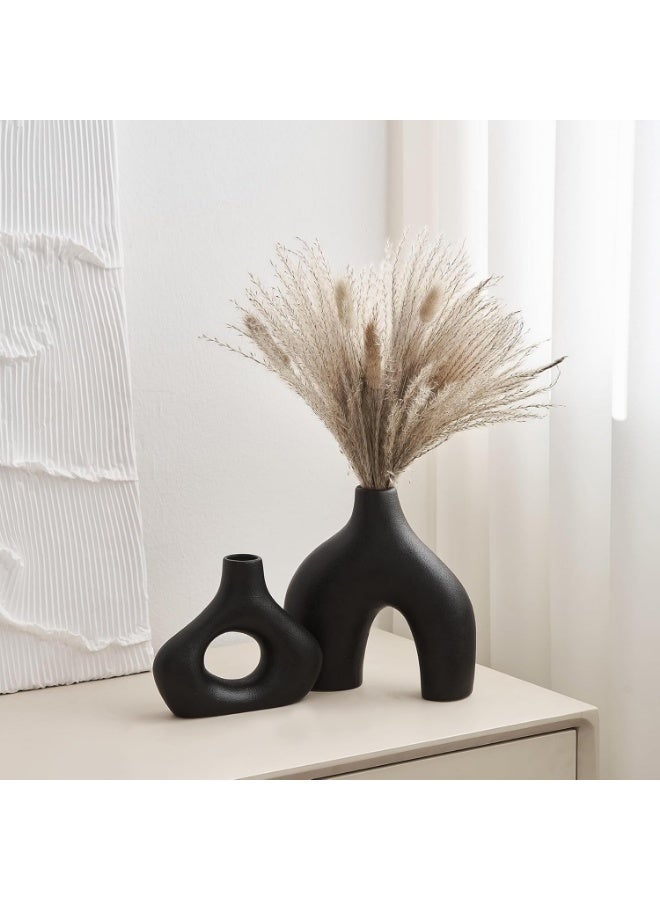 Razz Gallery This elegant black vase set consists of two matching pieces with a design that combines simplicity and elegance. - Image 5