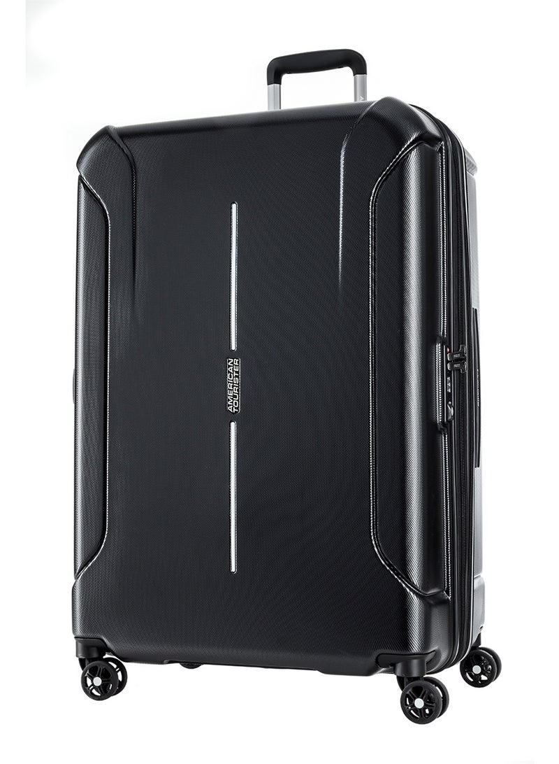 AMERICAN TOURISTER Technum Suitcase, Check-In Size 86 cm / 33 inch, 4 Spinner Wheels, Hard Top, Polycarbonate, Diamond Black|DuoSaf™ Security Zipper|Dual Tube Pull Handle|Expandable|TSA Lock - 3 Years International Warranty - Image 1