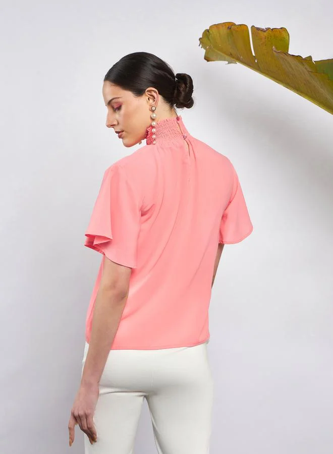 SASSAFRAS Smocked High Neck Top with Short Sleeves