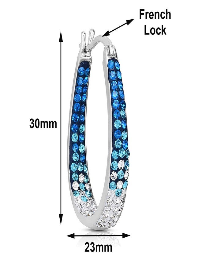 Savlano 14K White Gold Plated Inside Out Crystal Hoop Earrings For Women (Light Blue-White) - Image 3