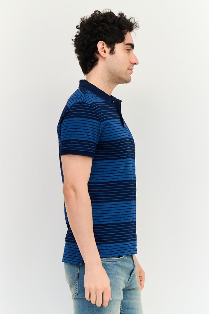 Levi's قميص بولو قصير الأكمام للرجال بتصميم عادي ومخطط، متعدد الألوان - Image 3