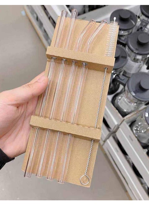 A set of juice straws. The set consists of 4 pieces made of glass only for drinking drinks, in addition to 1 brush for cleaning the straws after (the straws are transparent)