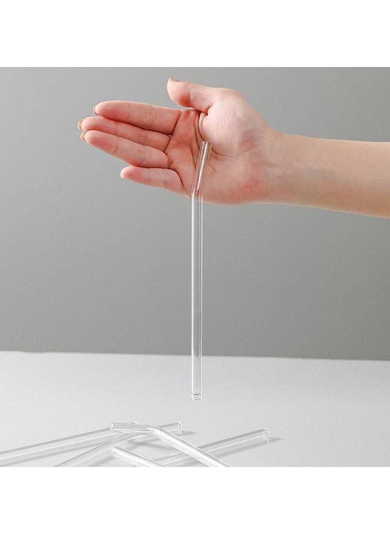 A set of juice straws. The set consists of 4 pieces made of glass only for drinking drinks, in addition to 1 brush for cleaning the straws after (the straws are transparent)