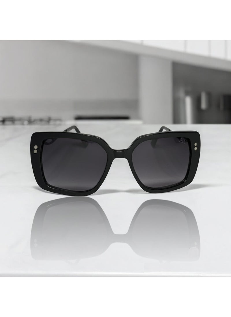 Armando Cavelli - Authentic Armando Cavelli sunglasses, crafted from carefully selected premium acetate for a luxurious look and longevity with extensive use. This model combines modernity and classic style, with a raw black acetate front and gunmetal -plated metal temples to complete your luxury look. Comes with premium polymer lenses offer UV400 protection in a gradient grey. - Image 1