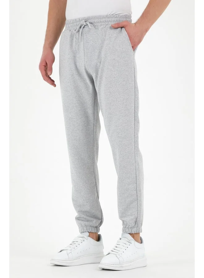 mmetalic Gray Men's Sweatpants with Label, Back and Side Pockets, Regular Fit, Elastic Cuffs.