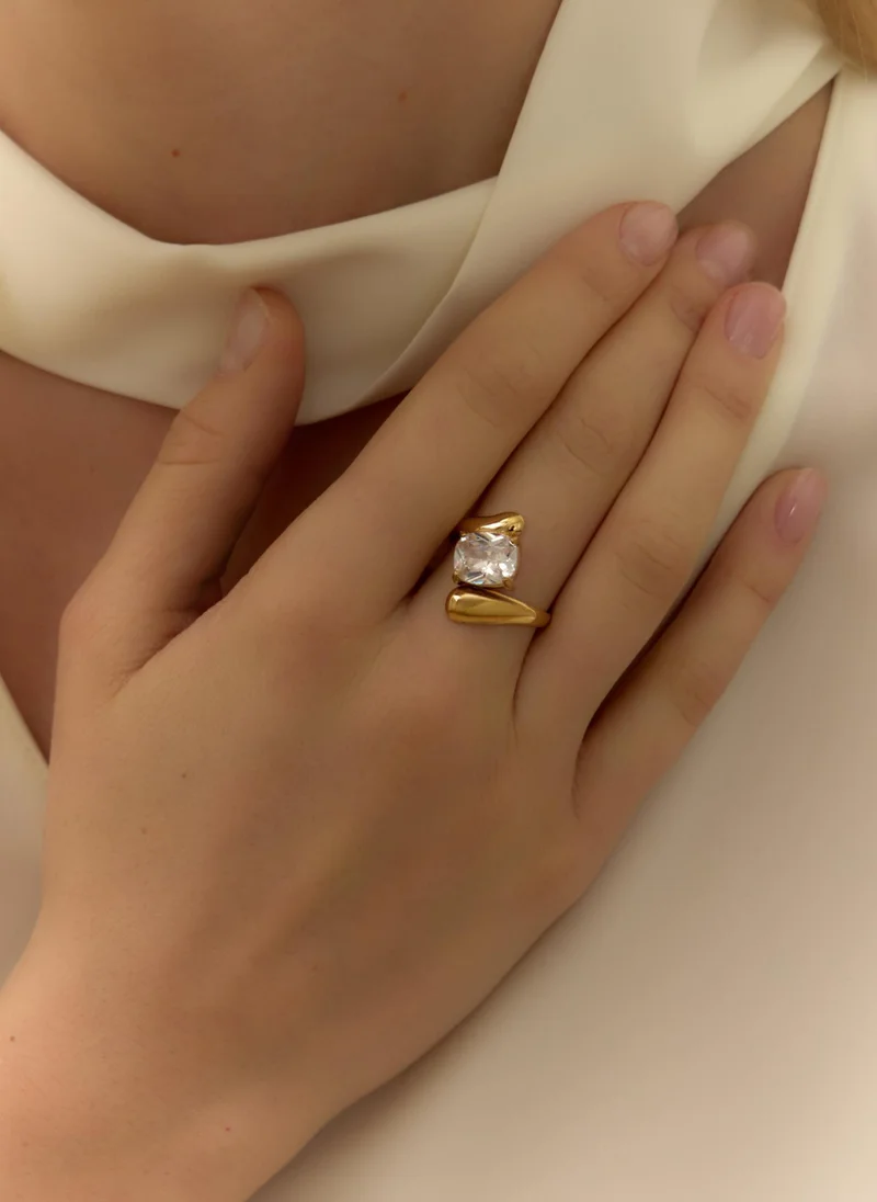 Intricately shaped ring with a large stone