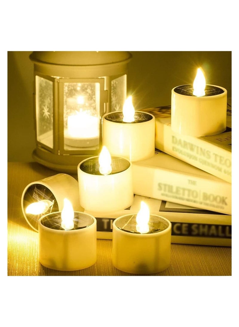SYOSI شموع شمسية، شموع شاي بالطاقة الشمسية للترتيب الخارجي، شموع LED قابلة لإعادة الشحن ومقاومة للماء IP65، زينة للحدائق والتخييم والحفلات في المنزل، 2.3" × 2" (يومض أصفر 6 قطع) - Image 1