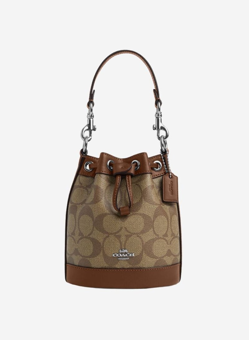 كوتش اوت ليت حقيبة دلو صغيرة من قماش Coach Signature - Image 1