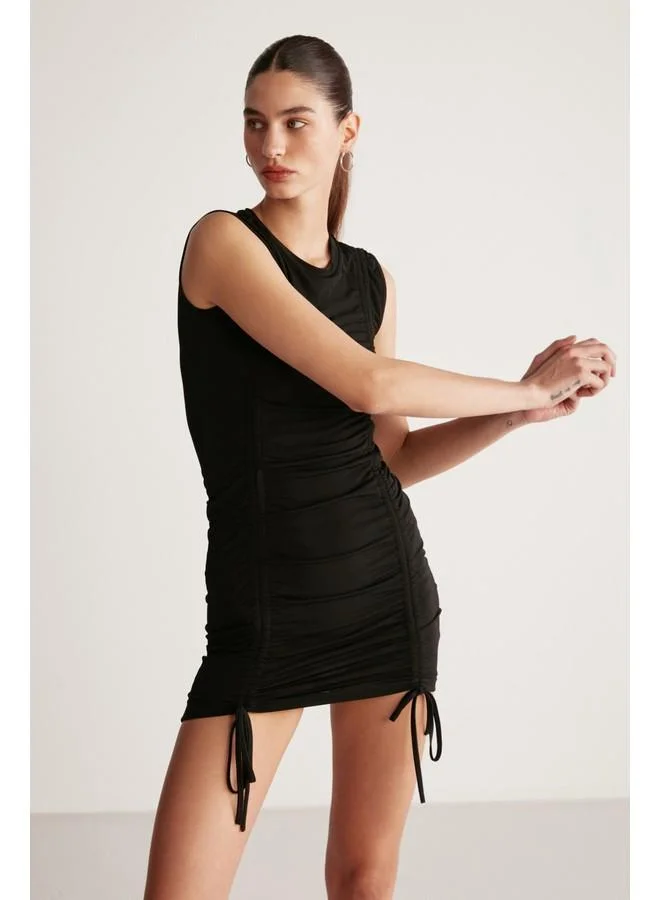 GRIMELANGE Grimelange Rachel Women's Draped Skirt Adjustable Length Bodycon Sandy Stretch Fabric Mini Black Dress