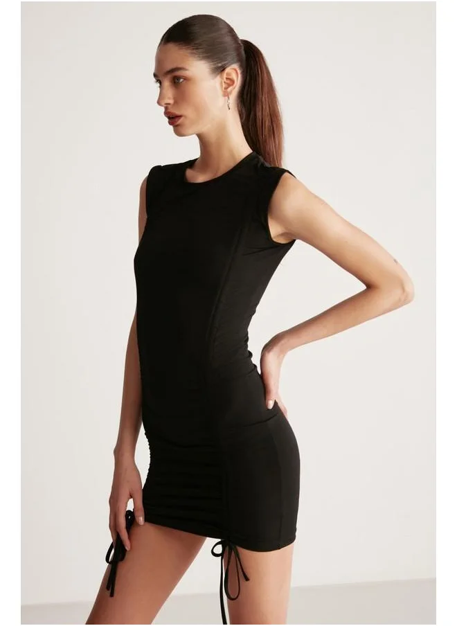 GRIMELANGE Grimelange Rachel Women's Draped Skirt Adjustable Length Bodycon Sandy Stretch Fabric Mini Black Dress