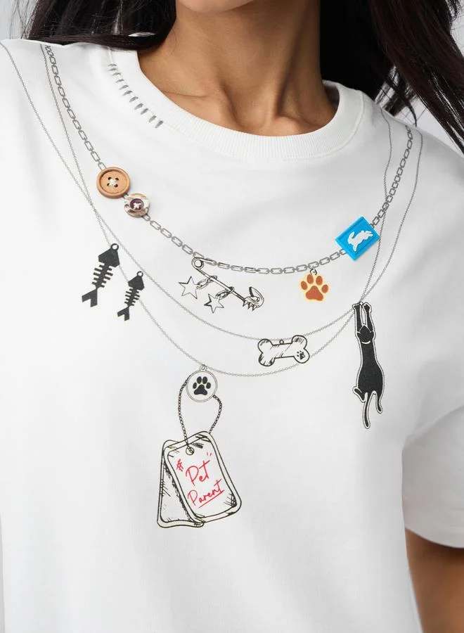 ذا سوليد ستور تيشيرت بقصة واسعة وطبعة علامة حيوان أليف