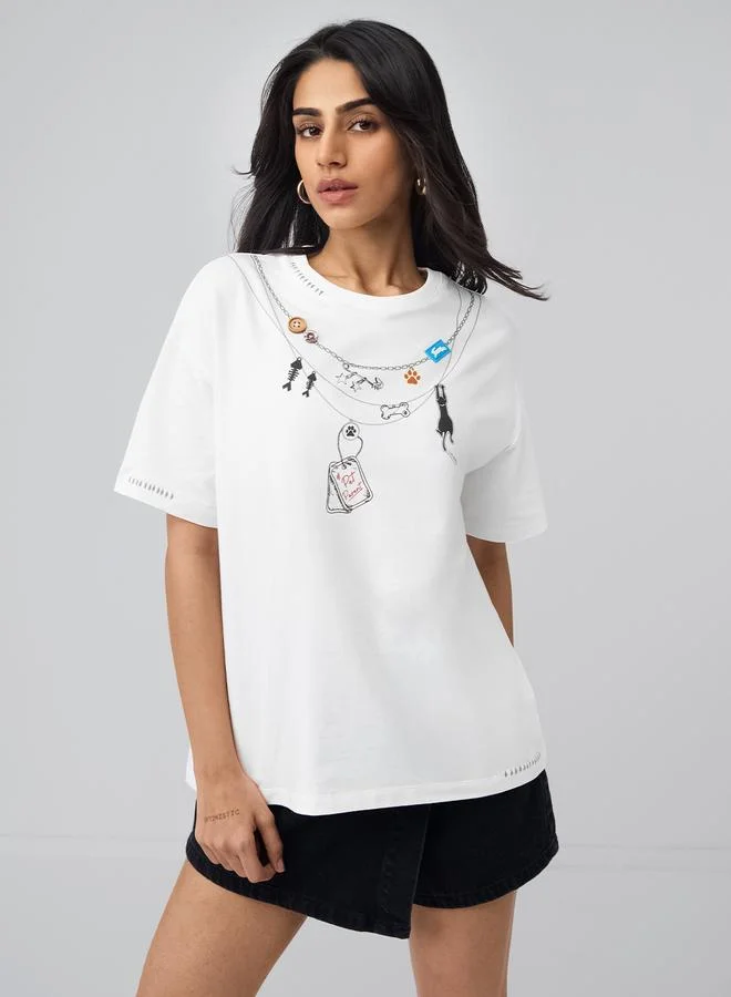 ذا سوليد ستور تيشيرت بقصة واسعة وطبعة علامة حيوان أليف