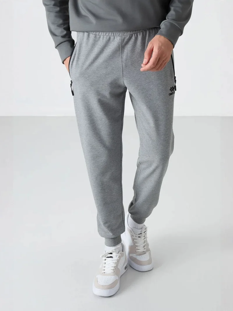 تومي لايف TOMMY Men's Solid Pull-on Sweatpants With Zip Pocket
