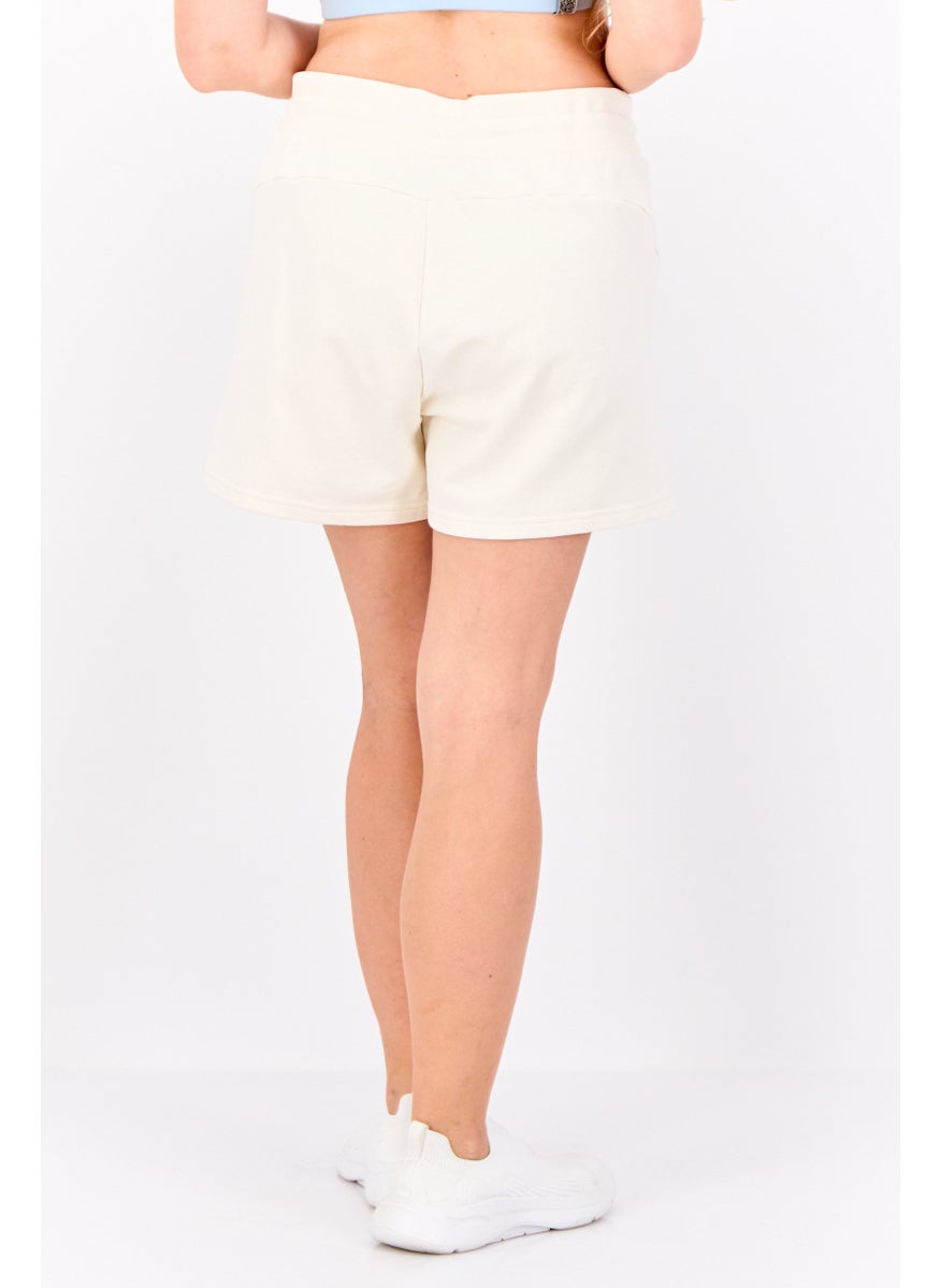 PUMA Women Sportswear Fit Brand Logo Outdoor Short, Cream  - Image 3
