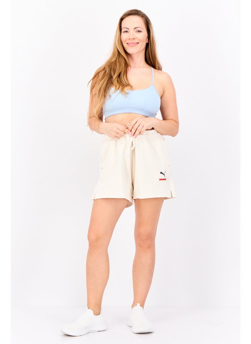 PUMA Women Sportswear Fit Brand Logo Outdoor Short, Cream  - Image 4