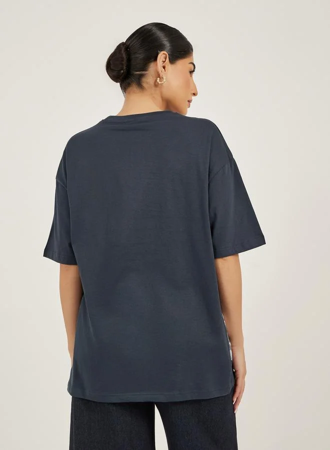 Styli Slogan Print Round Neck Oversized T-Shirt