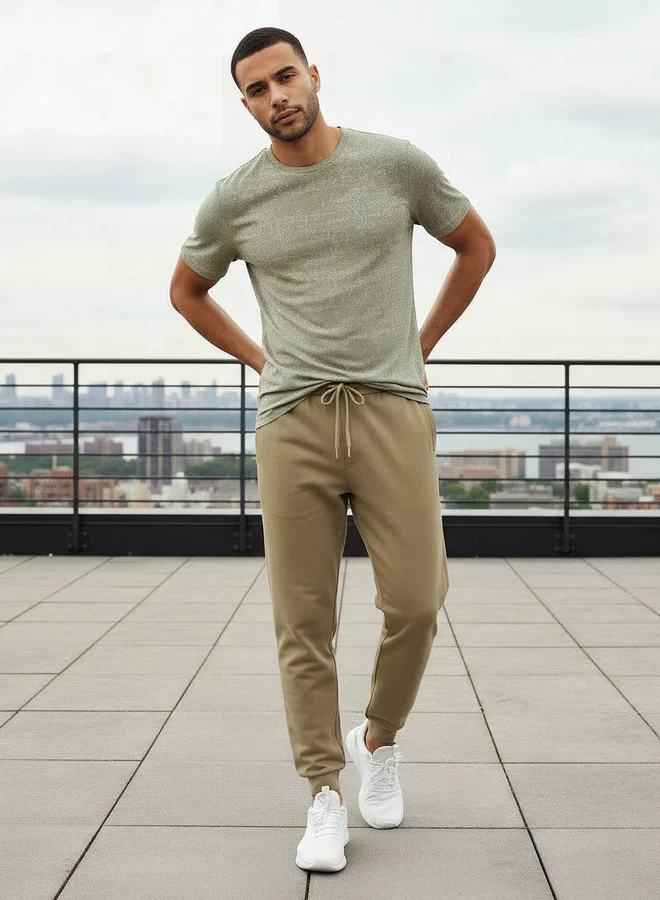 آكتف بنطلون رياضي رجالي بخصر مطاطي برباط